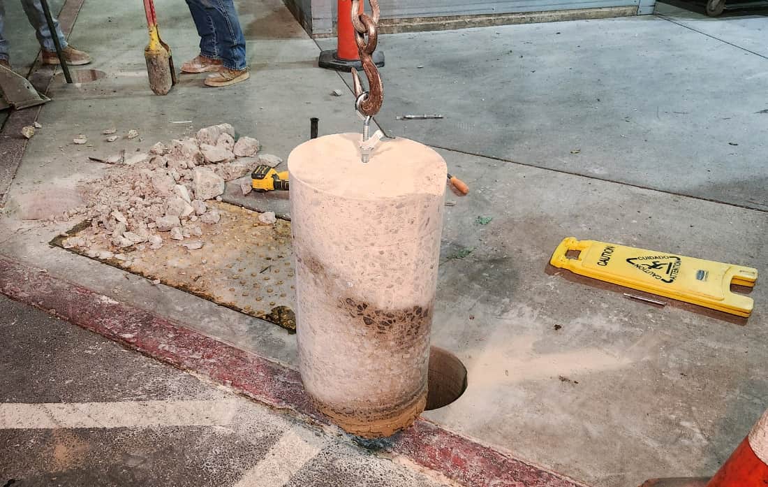 Concrete Bollard Installation Sparks Costco Concrete was over 2 thick Special core bits had to be ordered and extracted with equipment 1 | Anchor Concrete Concrete Bollard Installation Sparks Costco