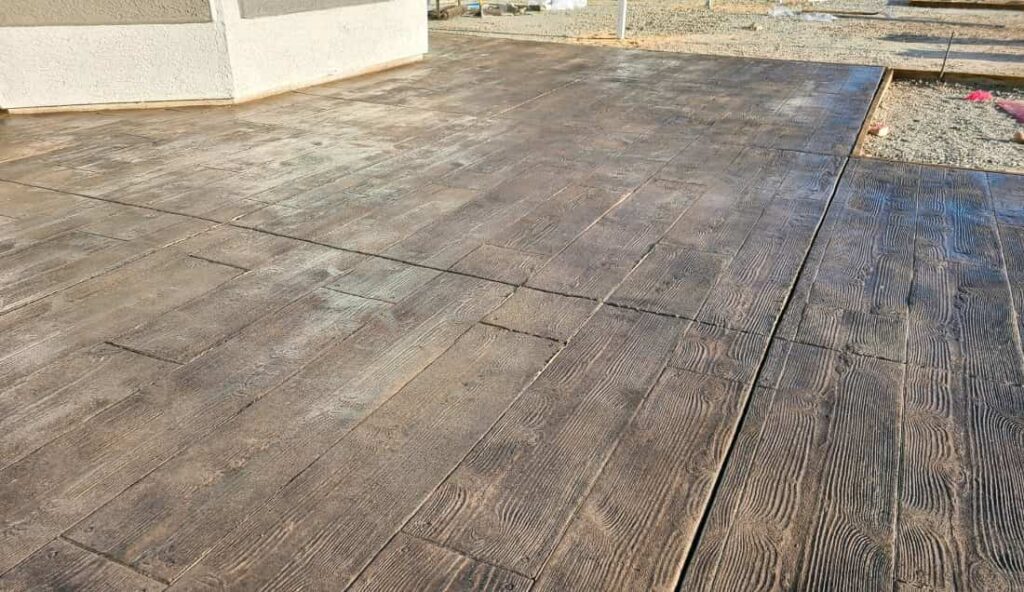 Stamped concrete patio with wood plank stamp